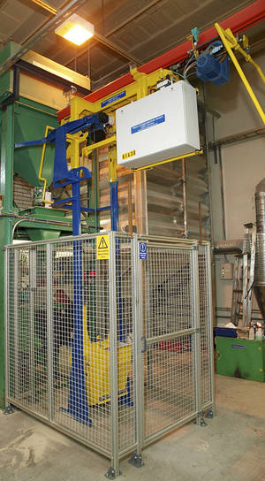 Loading of travelling container with core sand