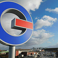 The Lungmuß logo on the new administration building shines above Dortmund harbor 