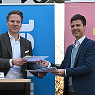 Trimet und Iqony vereinbaren Zusammenarbeit bei Fernwärme